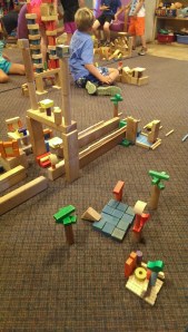 A resort with palm trees around the pool