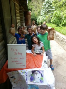 The Friendship Club made up of Pre-K, K and First Graders sold enough  bags of 50-cent popcorn April 27 to raise XX dollars for the Atlanta Humane Society.